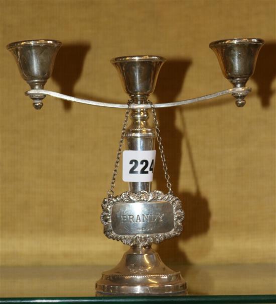 Modern silver two branch three light candelabrum,Birmingham 1981 & a silver spirit decanter label - Brandy, Birmingham 1979 (2)